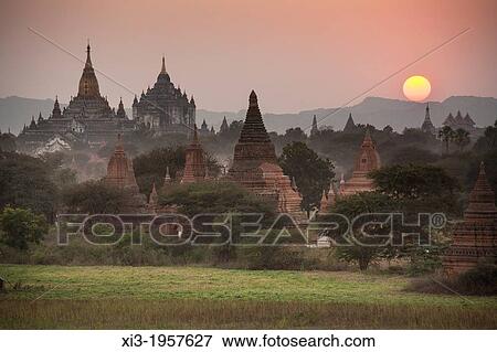 Ananda Temple on left and Thatbyinnyu Temple adjacent to Ananda Temple, at sunset, Bagan, Myanmar, (Burma). View Large Photo Image Stock Photo - Ananda Temple on left and Thatbyinnyu Temple adjacent to Ananda Temple, at sunset, Bagan, Myanmar, (Burma).. Fotosearch