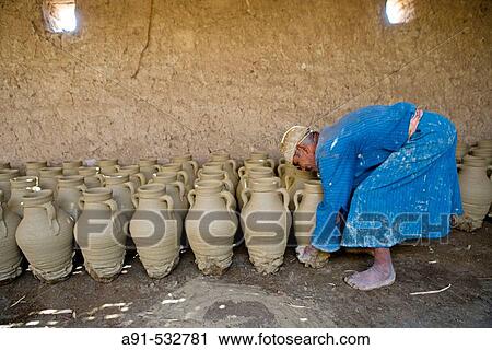 Ancestral pottery workshop near Maruza, between Qena and Luxor, using locally extract argil. Egypt View Large Photo Image Stock Image - Ancestral pottery workshop near Maruza, between Qena and Luxor, using locally extract argil. Egypt. Fotosearch