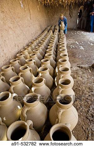 Ancestral pottery workshop near Maruza, between Qena and Luxor, using locally extract argil. Egypt View Large Photo Image Stock Image - Ancestral pottery workshop near Maruza, between Qena and Luxor, using locally extract argil. Egypt. Fotosearch