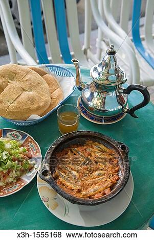 anchovy tagine in a restaurant of Chefchaouen, Rif region, Morocco, North Africa View Large Photo Image Stock Photo - anchovy tagine in a restaurant of Chefchaouen, Rif region, Morocco, North Africa. Fotosearch