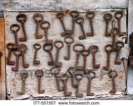 Ancient keys on a display board, outside a antique pieces seller shop near Cochin synagogue. Kochi (Cochin), Kerla, India. View Large Photo Image Stock Photo - Ancient keys on a display board, outside a antique pieces seller shop near Cochin synagogue. Kochi (Cochin), Kerla, India.. Fotosearch