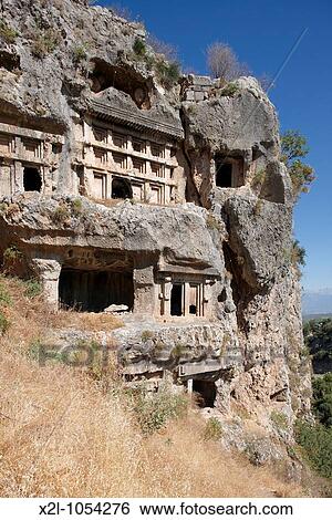 Ancient Lycian rock cut tombs in Tlos South West Turkey View Large Photo Image Stock Photograph - Ancient Lycian rock cut tombs in Tlos South West Turkey. Fotosearch