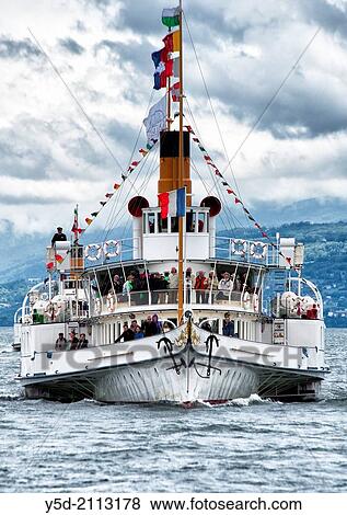 Ancient steamboat Geneva Lake, there are still several ancient steamboats having regular cruises on the lake, Switzerland, Europe. View Large Photo Image Stock Photo - Ancient steamboat Geneva Lake, there are still several ancient steamboats having regular cruises on the lake, Switzerland, Europe.. Fotosearch