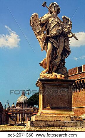 Angel Statue by Antonio Giorgetti, in Castel Sant Angelo bridge, Italy, Rome, Vatican City Saint Peter's basilica in background. View Large Photo Image Stock Image - Angel Statue by Antonio Giorgetti, in Castel Sant Angelo bridge, Italy, Rome, Vatican City Saint Peter's basilica in background.. Fotosearch