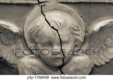 Stock Photo - Angel with crack. Palm Beach, FL, USA.. Fotosearch