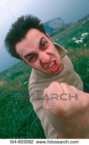 Angree young man View Large Photo Image Stock Image - Angree young man. Fotosearch