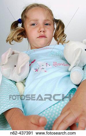 Angry blond child with dolls. View Large Photo Image Stock Image - Angry blond child with dolls.. Fotosearch