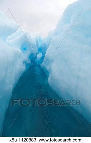 Antarctic peninsula -Port Lockroy Blue pressure ice is formed deep inside a glacier View Large Photo Image Stock Image - Antarctic peninsula -Port Lockroy Blue pressure ice is formed deep inside a glacier. Fotosearch