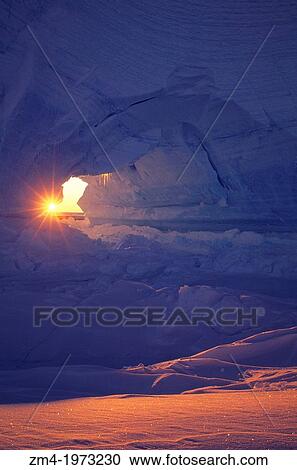 ANTARCTICA, ATKA ICEPORT, ICEBERG WITH ARCH, MIDNIGHT SUNSHINE, SUNBURST. View Large Photo Image Stock Image - ANTARCTICA, ATKA ICEPORT, ICEBERG WITH ARCH, MIDNIGHT SUNSHINE, SUNBURST.. Fotosearch