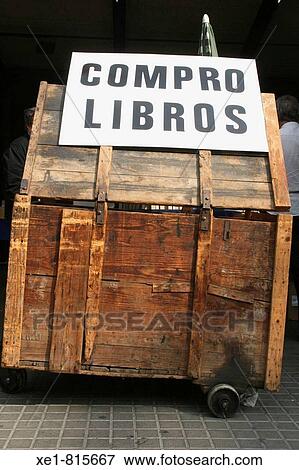 Stock Photo - Antiquarian bookshop wagons in Sant Antoni market, Barcelona. Catalonia, Spain. Fotosearch