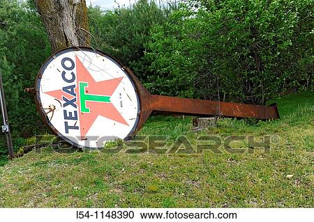 Stock Image - Antique Gasoline Signs at Nostalgia Gift Shop Rolla Missouri along Route 66. Fotosearch