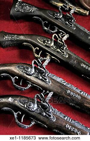 Stock Image - antique guns.. Fotosearch