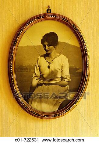 Antique photo of a young woman in oval golden frame, 1920? s View Large Photo Image Stock Image - Antique photo of a young woman in oval golden frame, 1920? s. Fotosearch