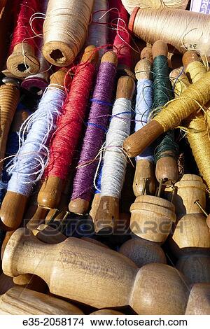 Antique spindles of thread View Large Photo Image Picture - Antique spindles of thread. Fotosearch