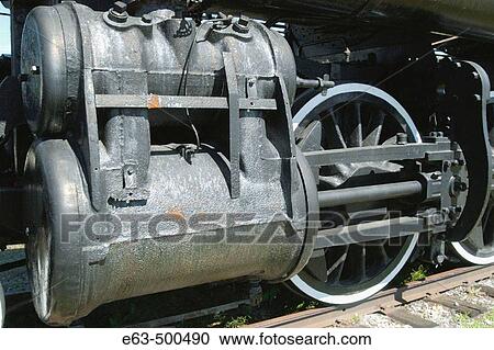 Stock Image - Antique steam locomotive running gear. Brighton, Ontario, Canada. Fotosearch