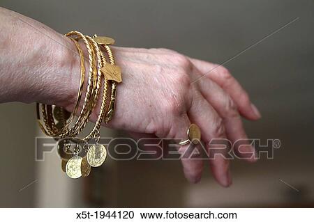 Antique tradition golden jewellery - bracelets and rings from Tripoli, Libya. View Large Photo Image Stock Image - Antique tradition golden jewellery - bracelets and rings from Tripoli, Libya.. Fotosearch