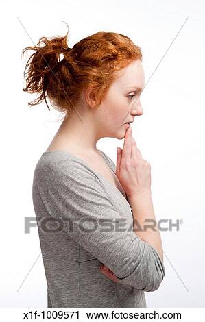 anxious worried red haired woman girl View Large Photo Image Stock Image - anxious worried red haired woman girl. Fotosearch