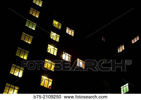 Apartment building at night and in the lighted windows. South Kensington, London, England, UK, Europe View Large Photo Image Stock Image - Apartment building at night and in the lighted windows. South Kensington, London, England, UK, Europe. Fotosearch