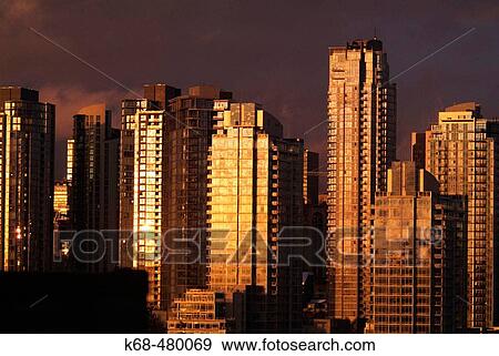 Stock Photo - Apartment buildings in the West End, at sunset, downtown Vancovuer, BC, Canada. Fotosearch