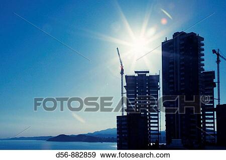 Apartment buildings under construction, Benidorm, Alicante province. Spain View Large Photo Image Stock Photo - Apartment buildings under construction, Benidorm, Alicante province. Spain. Fotosearch