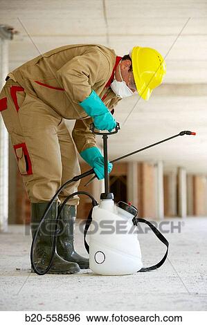 Aplying releasing agent with spray, concrete mould, housing construction. Guipuzcoa, Euskadi, Spain View Large Photo Image Stock Photograph - Aplying releasing agent with spray, concrete mould, housing construction. Guipuzcoa, Euskadi, Spain. Fotosearch