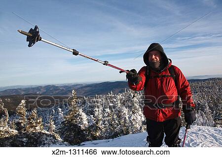 Appalachian Trail - A winter hiker stands on the summit of Mount Moriah during the winter months in the White Mountains, New Hampshire USA View Large Photo Image Stock Photograph - Appalachian Trail - A winter hiker stands on the summit of Mount Moriah during the winter months in the White Mountains, New Hampshire USA. Fotosearch