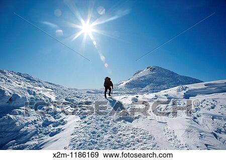 Stock Photo - Appalachian Trail - Hiker along the Crawford Path in the Presidential Range during the winter months in the White Mountains, New Hampshire USA. Fotosearch