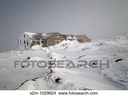 Appalachian Trail - Lakes of the Clouds Hut in whiteout conditions Located on Crawford Path, which is in the White Mountain National Forest of New Hampshire, USA Note: On a clear day Mount Washington can be seen in the background View Large Photo Image Picture - Appalachian Trail - Lakes of the Clouds Hut in whiteout conditions Located on Crawford Path, which is in the White Mountain National Forest of New Hampshire, USA Note: On a clear day Mount Washington can be seen in the background. Fotosearch
