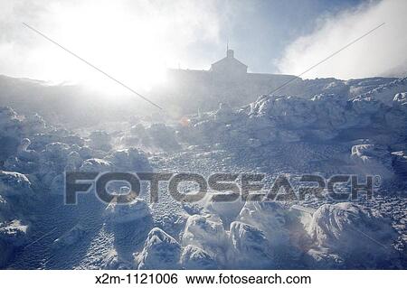 Stock Photograph - Appalachian Trail - Lakes of the Clouds Hut in extreme weather conditions along Crawford Path in the Presidential Range in the White Mountains, New Hampshire USA. Fotosearch