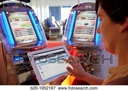 Stock Photo - Application for tablets online betting. Sports Bookmaker. KirolSoft. Eibar. Gipuzkoa, Basque Country, Spain.. Fotosearch