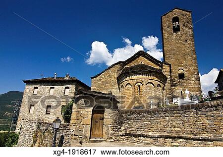 Apse and bell tower of the church Mozarabic - Romanesque San Martin de OlivBn - Serrablo - Alto Gallego - Huesca Province - Aragon - Aragon Pyrenees - Spain - Europe View Large Photo Image Stock Photo - Apse and bell tower of the church Mozarabic - Romanesque San Martin de OlivBn - Serrablo - Alto Gallego - Huesca Province - Aragon - Aragon Pyrenees - Spain - Europe. Fotosearch