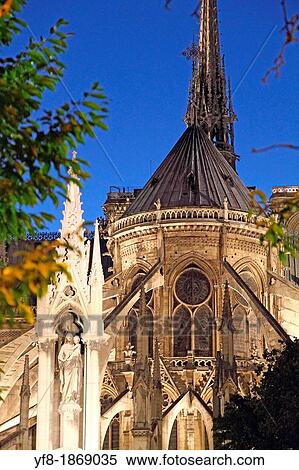 Stock Photography - Apse of Notre Dame Cathedral at dusk, Paris, France. Fotosearch