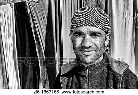 Arab man portrait with fabrics in oasis Town of Chebika near Mides and Tamerza Tunisia in Africa View Large Photo Image Stock Photograph - Arab man portrait with fabrics in oasis Town of Chebika near Mides and Tamerza Tunisia in Africa. Fotosearch