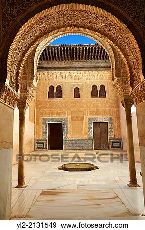 Arabesque Moorish architecture of an inner courtyard of the Palacios Nazaries, Alhambra. Granada, Andalusia, Spain. View Large Photo Image Stock Photo - Arabesque Moorish architecture of an inner courtyard of the Palacios Nazaries, Alhambra. Granada, Andalusia, Spain.. Fotosearch