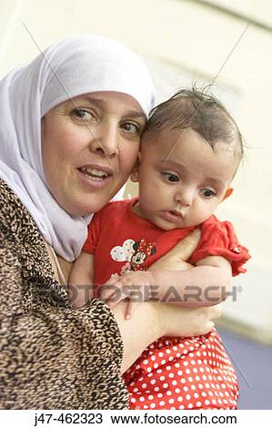 Arabic mother and child bonding View Large Photo Image Stock Image - Arabic mother and child bonding. Fotosearch