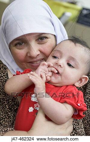 Picture - Arabic mother and child. Fotosearch