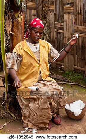Arba Minch Chencha Ethiopia Africa Dorze tribe village local woman spin cotton with traditional methods and spinning wheel 12 View Large Photo Image Stock Photography - Arba Minch Chencha Ethiopia Africa Dorze tribe village local woman spin cotton with traditional methods and spinning wheel 12. Fotosearch