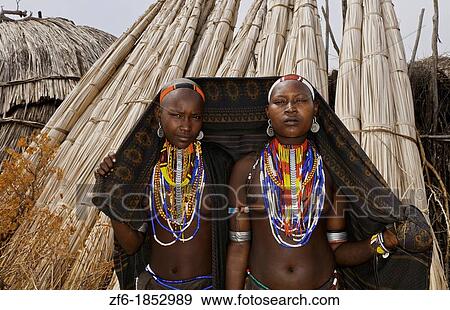 Stock Photo - Arbore Tribe Ethiopia Africa Erbore tribal village Lower Omo Valley young girls with colorful dress 27. Fotosearch