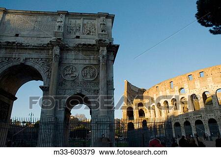 Arch of Titus and Colosseum. Rome. Italy. View Large Photo Image Stock Photo - Arch of Titus and Colosseum. Rome. Italy.. Fotosearch