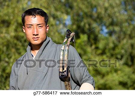 Archer. Paro, Bhutan View Large Photo Image Stock Photo - Archer. Paro, Bhutan. Fotosearch