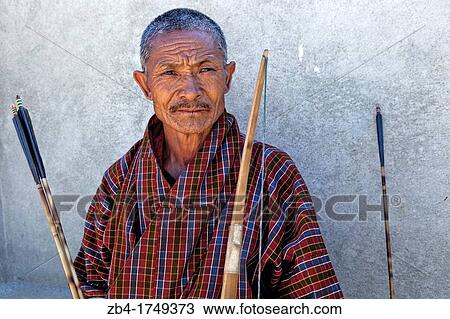 Archery, Bhutan's national sport, Thimphu, Bhutan, Asia. View Large Photo Image Stock Image - Archery, Bhutan's national sport, Thimphu, Bhutan, Asia.. Fotosearch