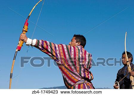 Archery, Bhutan's national sport, Bumthang, Bhutan, Asia. View Large Photo Image Stock Image - Archery, Bhutan's national sport, Bumthang, Bhutan, Asia.. Fotosearch