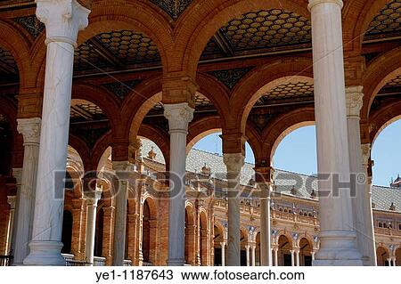 Arches and columns of the Plaza de Espana, Seville, Andalusia, Spain. View Large Photo Image Stock Image - Arches and columns of the Plaza de Espana, Seville, Andalusia, Spain.. Fotosearch
