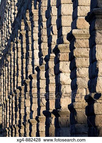 Arches and pillars built with granite blocks without mortar in the Roman aqueduct of Segovia - Castilla-Le? n - Spain View Large Photo Image Stock Photo - Arches and pillars built with granite blocks without mortar in the Roman aqueduct of Segovia - Castilla-Le? n - Spain. Fotosearch