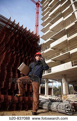 Architect, corrugated iron for formwork, housing construction View Large Photo Image Stock Photo - Architect, corrugated iron for formwork, housing construction. Fotosearch
