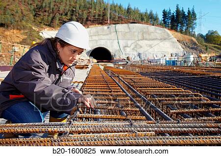 Architect overseeing the installation of rebar, reinforcing steel bars for concrete formwork, Construction of viaduct, Works of the new railway platform in the Basque Country, High-speed train? Basque Y? View Large Photo Image Stock Photography - Architect overseeing the installation of rebar, reinforcing steel bars for concrete formwork, Construction of viaduct, Works of the new railway platform in the Basque Country, High-speed train? Basque Y?. Fotosearch