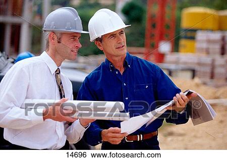 Stock Photograph - Architects at construction site. Fotosearch