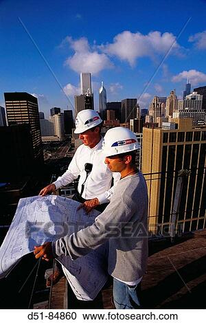 Architects, construction of high-rise building in Chicago. Illinois, USA View Large Photo Image Stock Image - Architects, construction of high-rise building in Chicago. Illinois, USA. Fotosearch