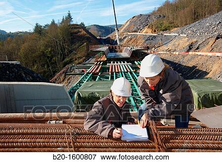 Architects, Construction of viaduct, Works of the new railway platform in the Basque Country, High-speed train? Basque Y? View Large Photo Image Stock Photo - Architects, Construction of viaduct, Works of the new railway platform in the Basque Country, High-speed train? Basque Y?. Fotosearch