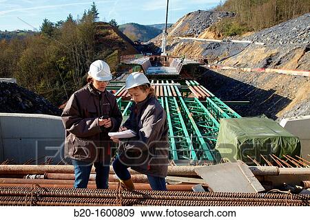 Architects, Construction of viaduct, Works of the new railway platform in the Basque Country, High-speed train? Basque Y? View Large Photo Image Stock Photo - Architects, Construction of viaduct, Works of the new railway platform in the Basque Country, High-speed train? Basque Y?. Fotosearch